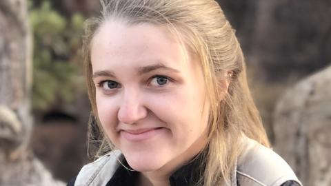 PhD candidate Sophie Everbach sitting outside