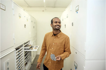 Anshuman Swain with fossil specimens. By Kris Snibbe-Harvard Staff Photographer