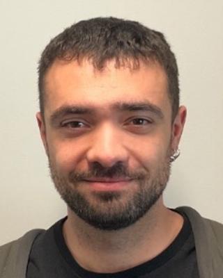 Portrait of postdoc Francesc Perez Peris with a beard