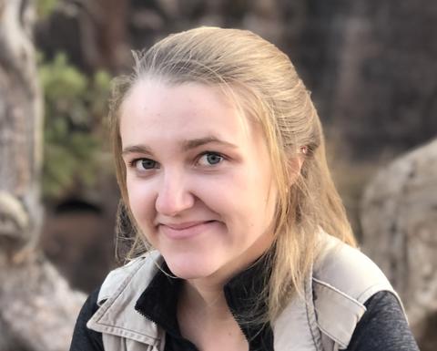 PhD candidate Sophie Everbach sitting outside